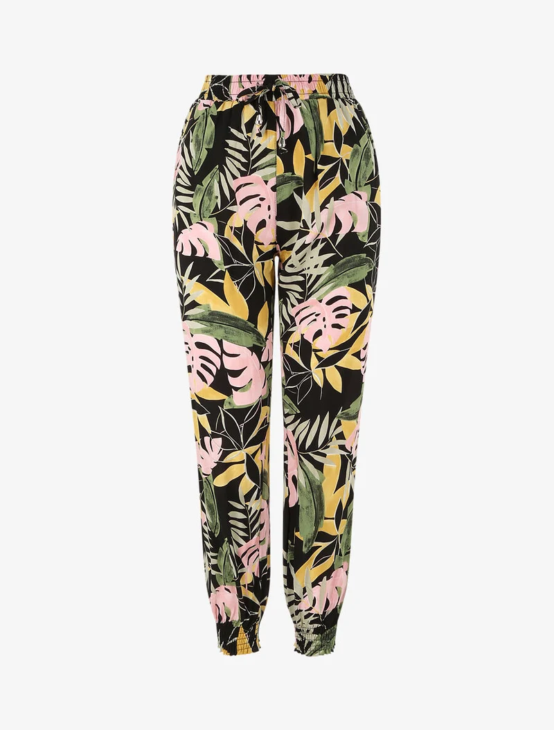 Fließende Hose mit tropischem Blumenmuster und elastischen Rändern - Schwarz