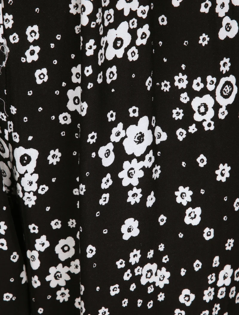 Haremhose mit Gänseblümchenmuster - Schwarz