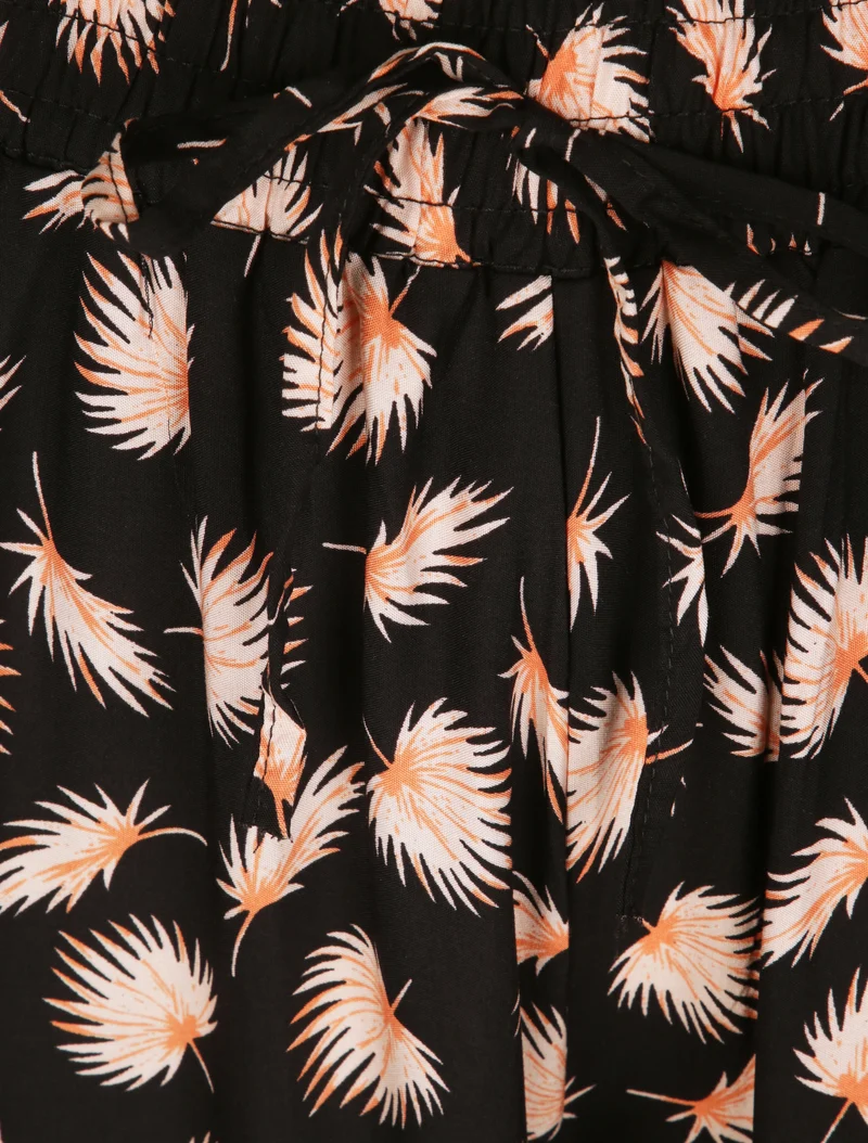 Haremshose mit Palmblätter-Print - Schwarz