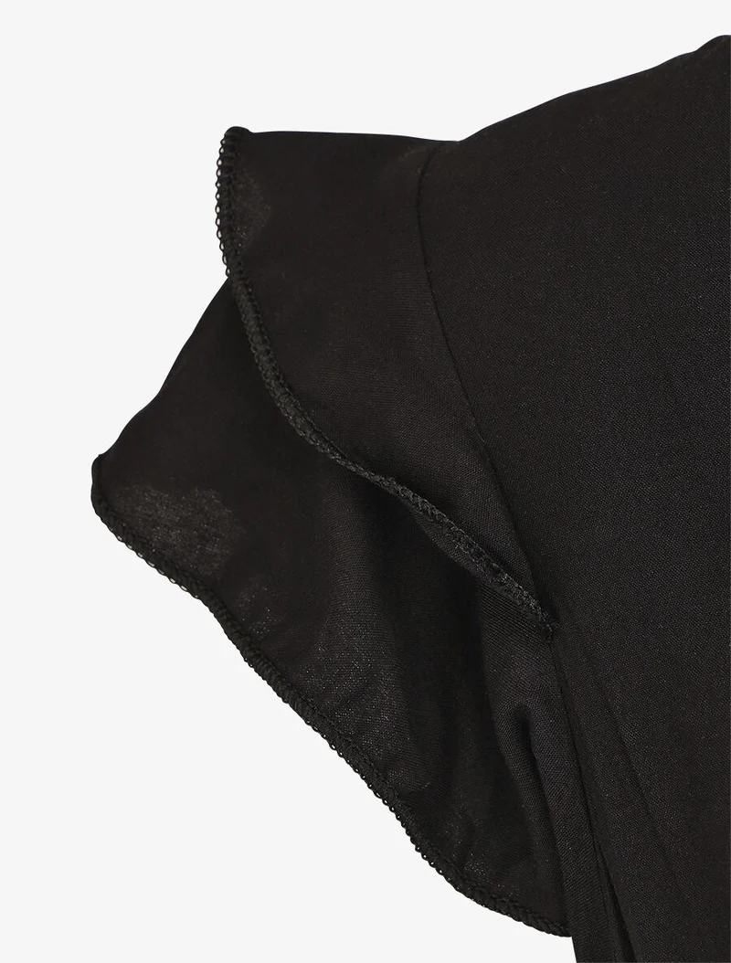 Ärmelloses, einfarbiges, langes Kleid mit Rüschen. - Schwarz