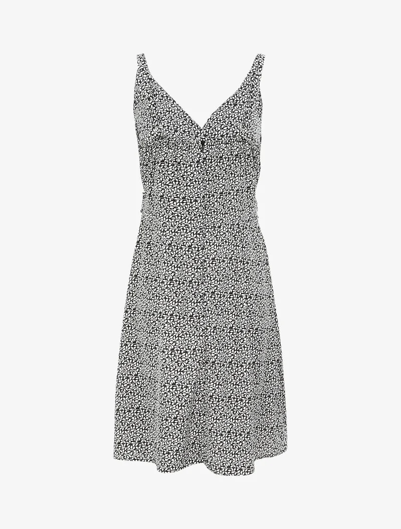 Empire-Kleid mit kurzem Rock und Wickelkragen im Blätterdruck. - Schwarz