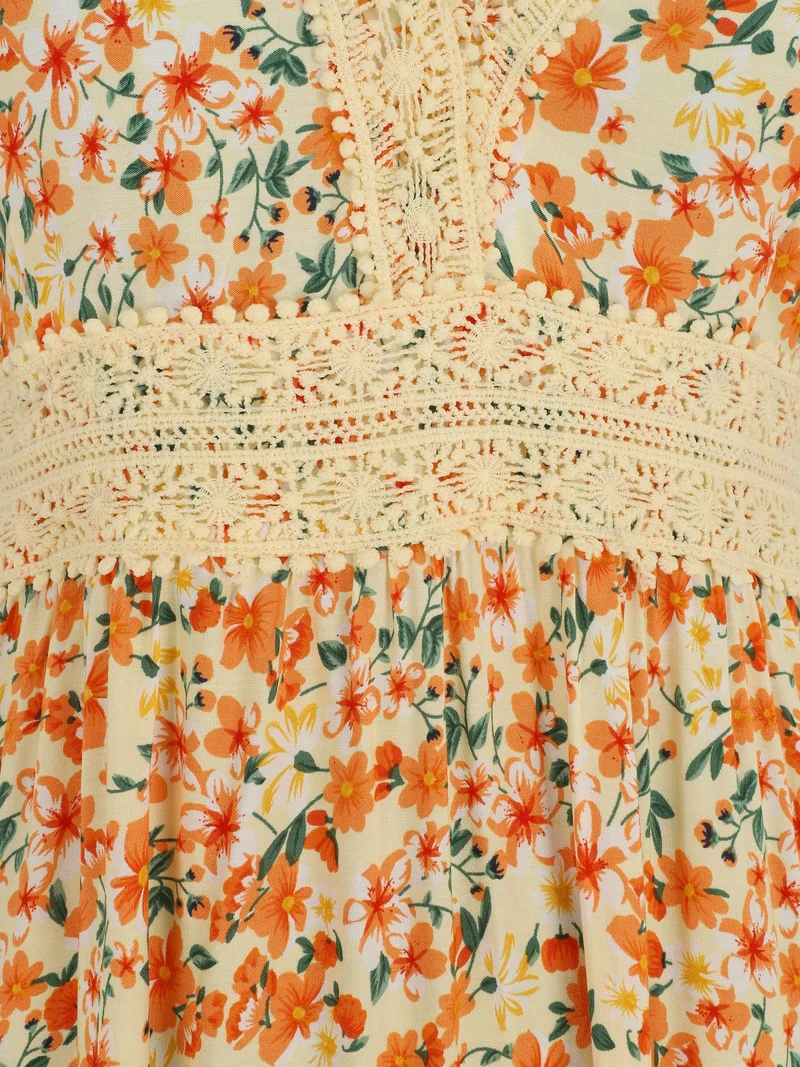 Langes Kleid mit Spitzenkragen und Blumenmuster. - Beige