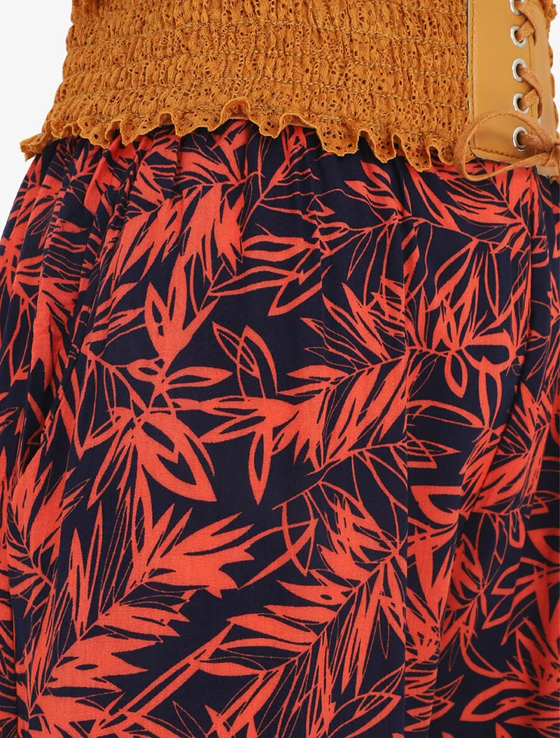 Gerade geschnittene Hose mit hohem Bund und Pflanzenmuster. - Rot