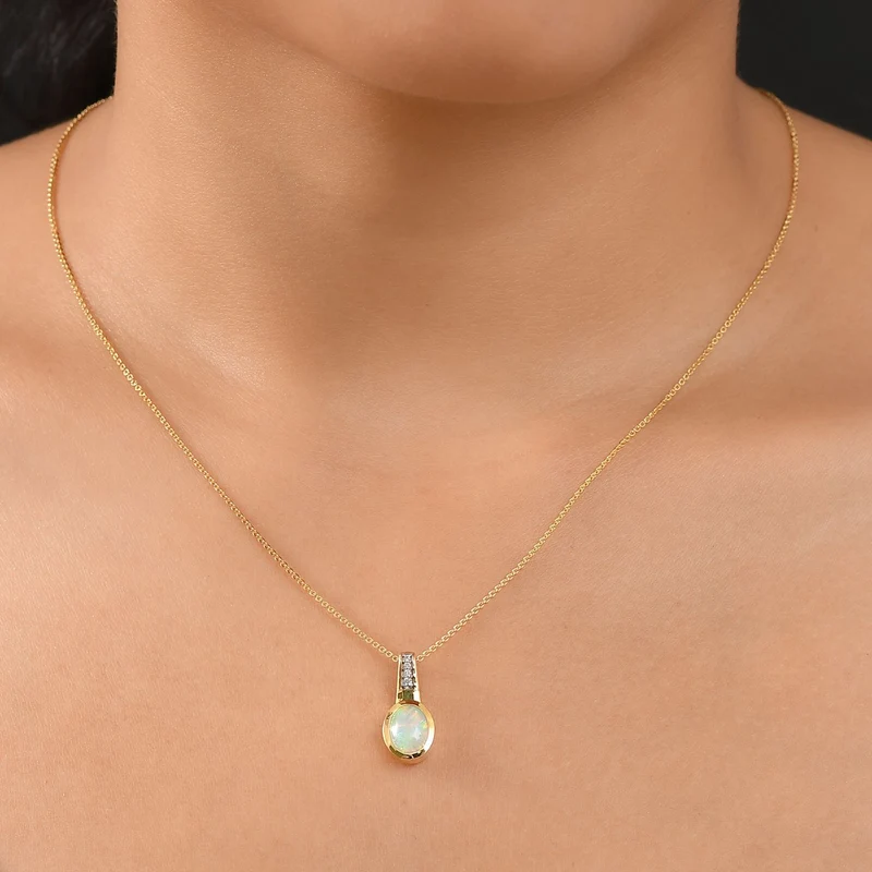 D joy Natürlicher, äthiopischer Welo Opal, Smaragd Anhänger mit Kette, 925 Silber 750 Gelbgold Vermeil ca. 1.32 ct