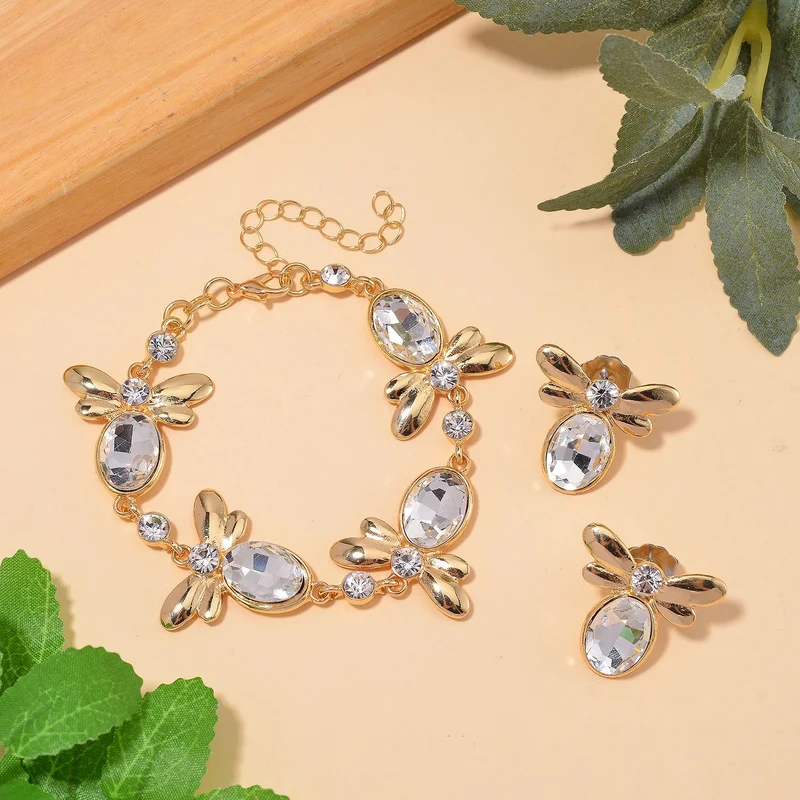 DESIGNER INSPIRIERT - 2er Set - Weißer Kristall Armband (ca. 19 cm + 5 cm Extender) und Ohrringe, goldfarben