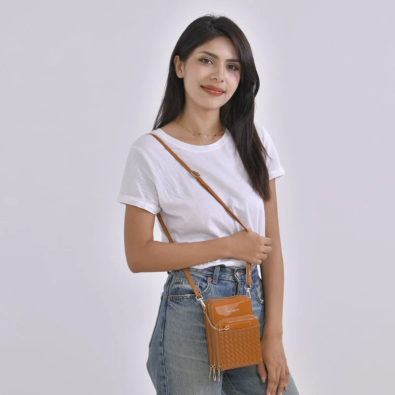 PASSAGE geprägte Kunstleder-Umhängetasche mit RFID-Schutz und langer Trageriemen, 13x7.5x19 cm, Orange