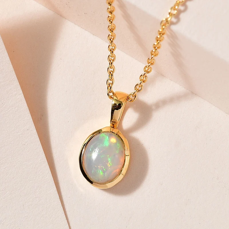 AA Natürlicher, äthiopischer Welo Opal Schmuckset 925 Silber vergoldet ca. 1,25 ct.