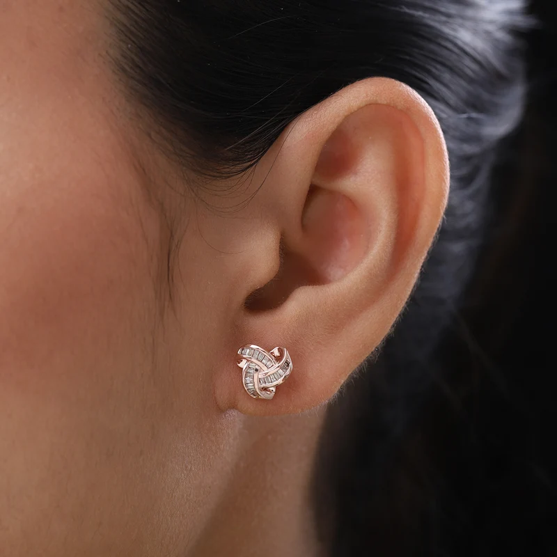 D'Joy blaue Diamant Liebesknoten Ohrstecker, 925 Silber platiniert - 0,25 ct.
