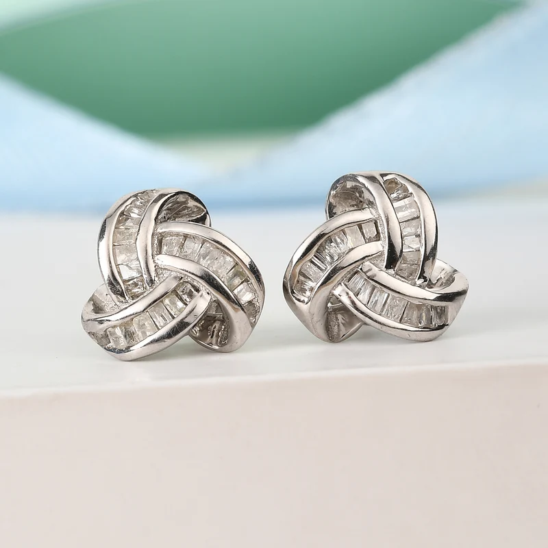 D'Joy blaue Diamant Liebesknoten Ohrstecker, 925 Silber platiniert - 0,25 ct.