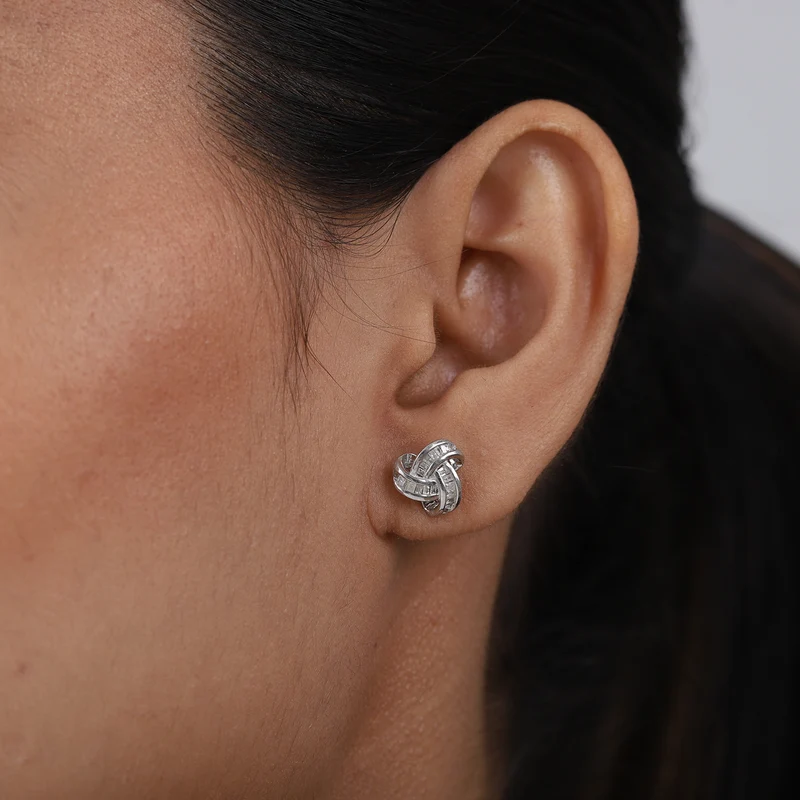 D'Joy blaue Diamant Liebesknoten Ohrstecker, 925 Silber platiniert - 0,25 ct.
