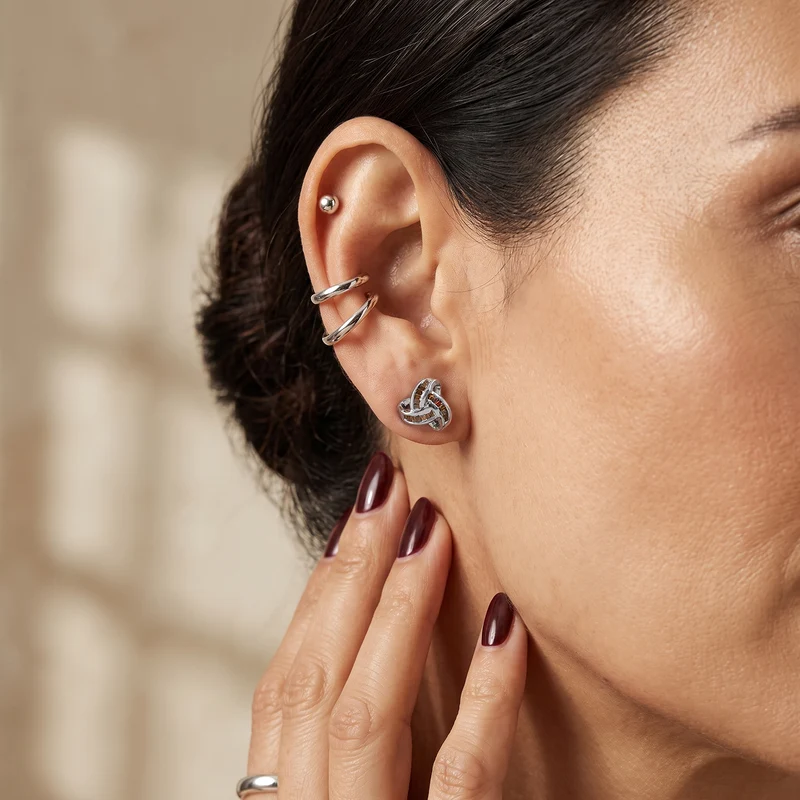 D'Joy blaue Diamant Liebesknoten Ohrstecker, 925 Silber platiniert - 0,25 ct.