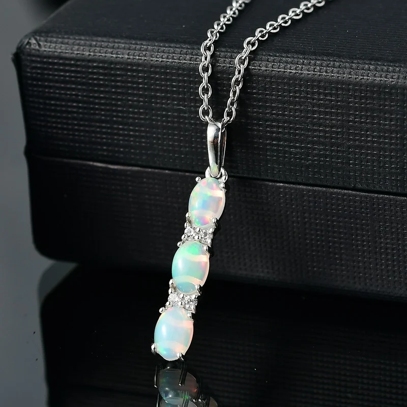AA Natürlicher, äthiopischer Welo Opal, Weißer Zirkon Schmuckset 925 Silber platiniert und Edelstahl platiniert ca. 1,05 ct.