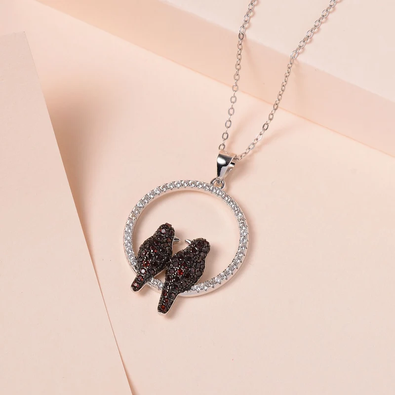 Weißer Zirkon, Roter Granat Schmuckset 925 Silber Zweifarbige Beschichtung und Edelstahl ca. 0.45 ct