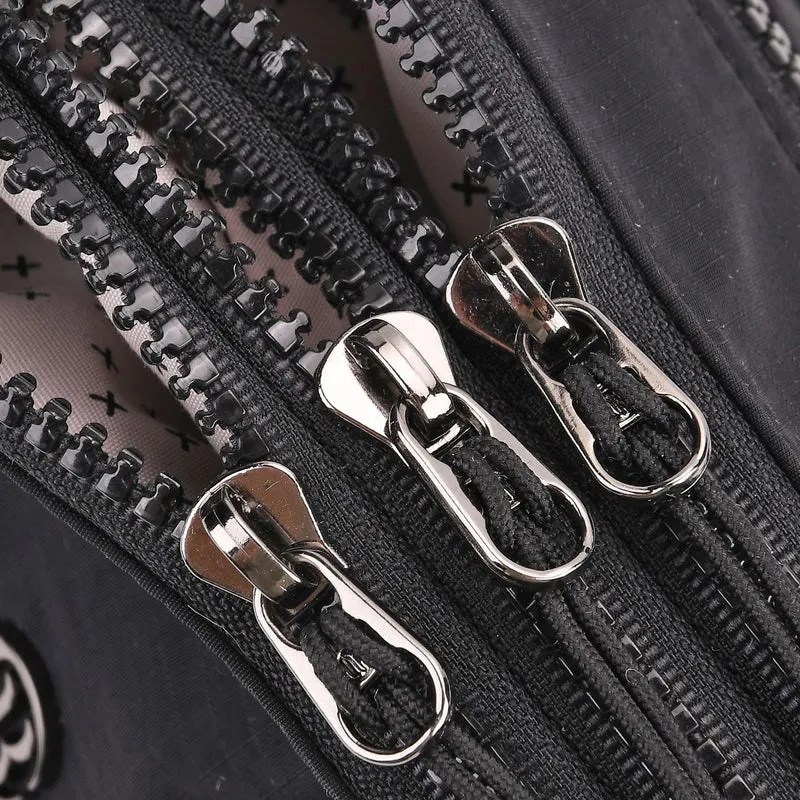 Crossbody-Tasche aus Nylon, mit mehreren Reißverschlussfächern und verstellbarem Schulterriemen, 24x15x9cm, Schwarz