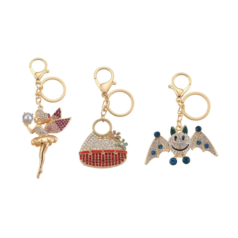 3er-Set emaillierte weiße, blaue und mehrfarbige Kristall-Schlüsselanhänger, Fee, Handtasche und Fledermau, Legierung in Gelbgold