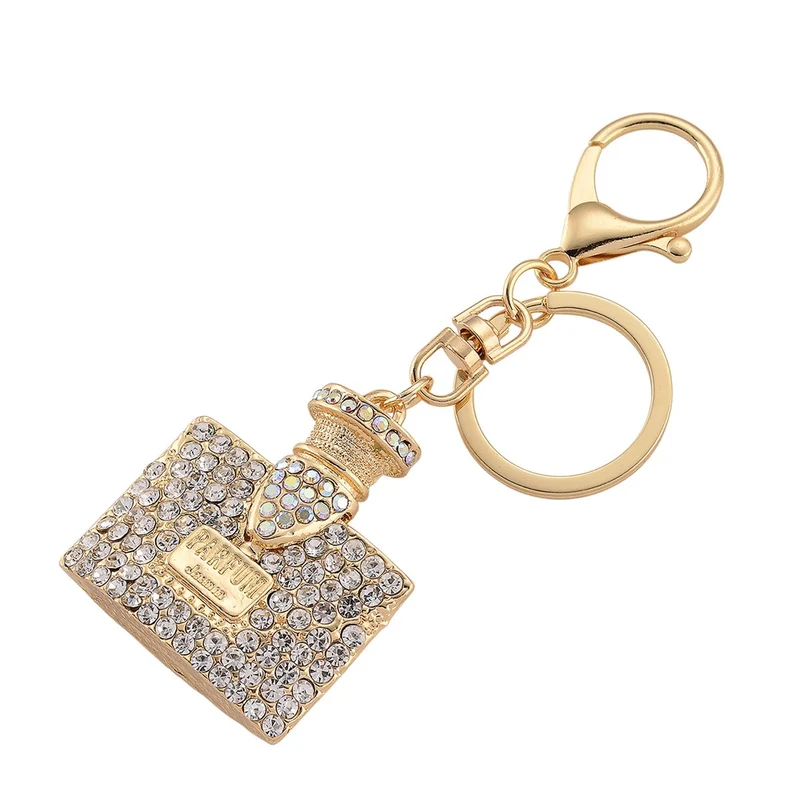 3er-Set emaillierte weiße und mehrfarbige Kristall-Schlüsselanhänger, Pumps, Delfin und Parfümflakon, Legierung in Gelbgold