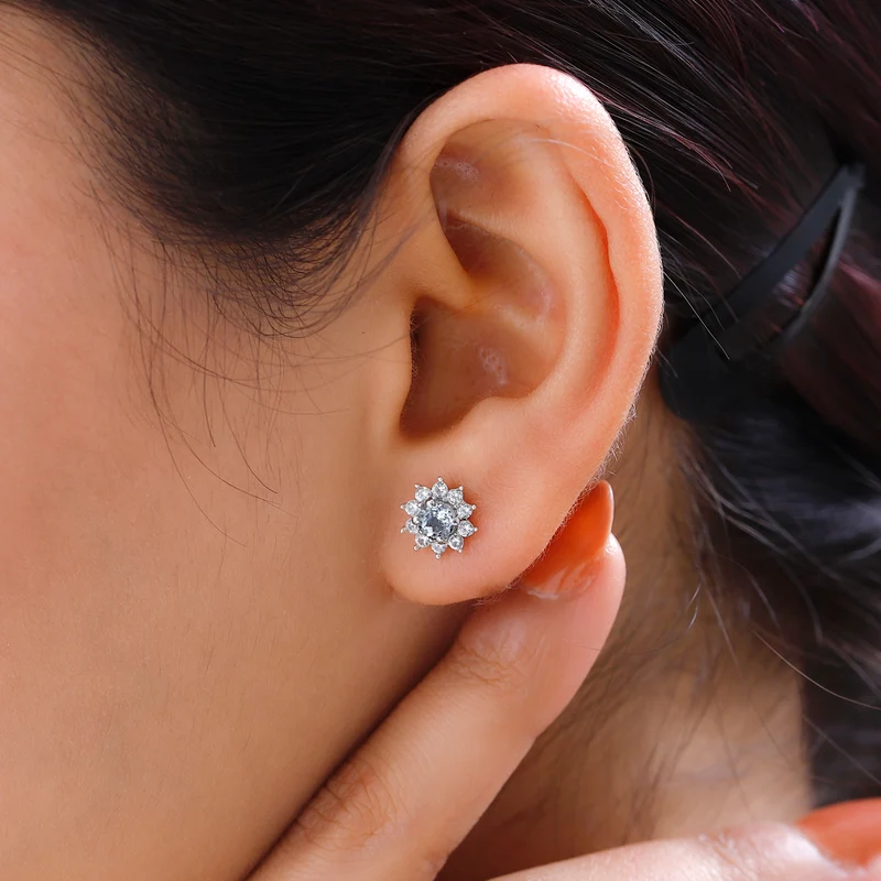Tansanit und weiße Zirkon Ohrstecker, 925 Silber platiniert ca. 1.09 ct