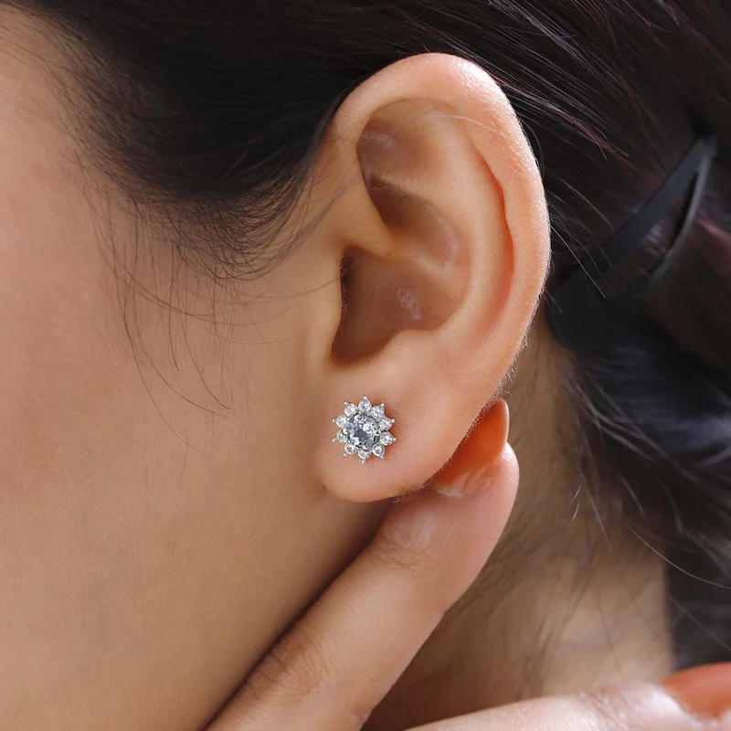 Tansanit und weiße Zirkon Ohrstecker, 925 Silber platiniert ca. 1.09 ct