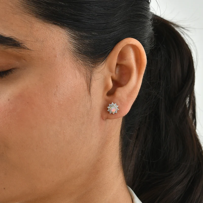 Tansanit und weiße Zirkon Ohrstecker, 925 Silber platiniert ca. 1.09 ct