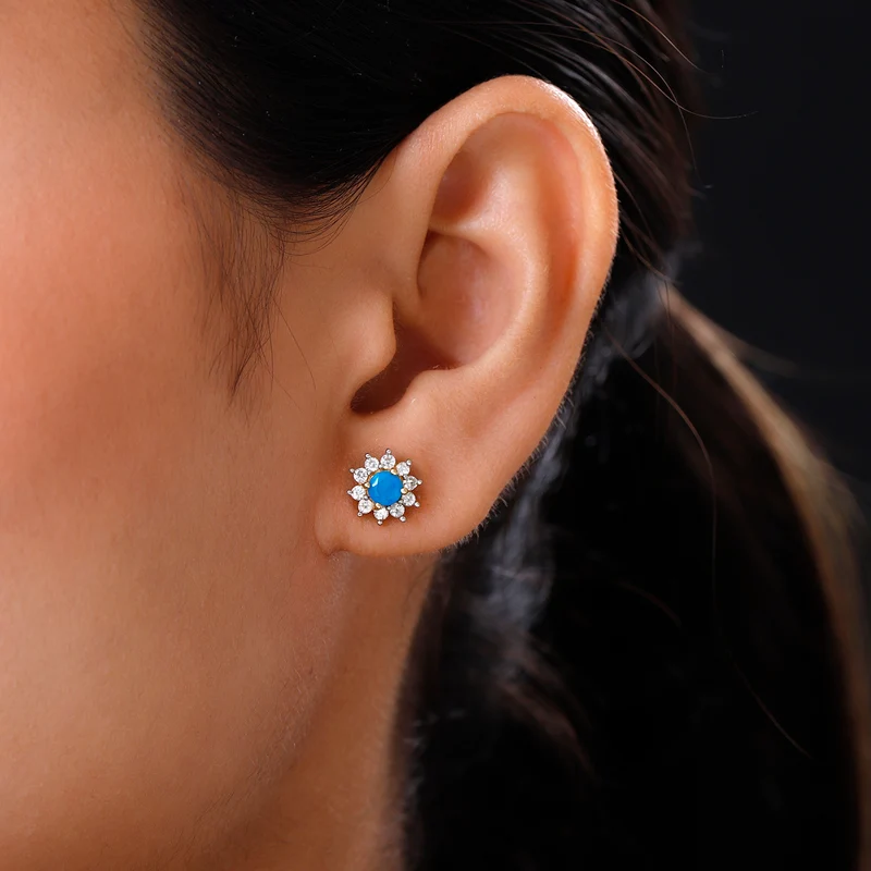 Tansanit und weiße Zirkon Ohrstecker, 925 Silber platiniert ca. 1.09 ct