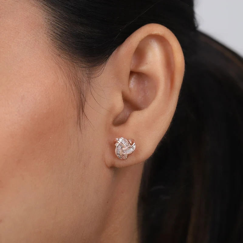 0,25 Ct. Gelber Diamant Knoten Ohrstecker aus 925 Silber platiniert