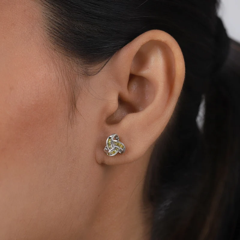 0,25 Ct. Gelber Diamant Knoten Ohrstecker aus 925 Silber platiniert
