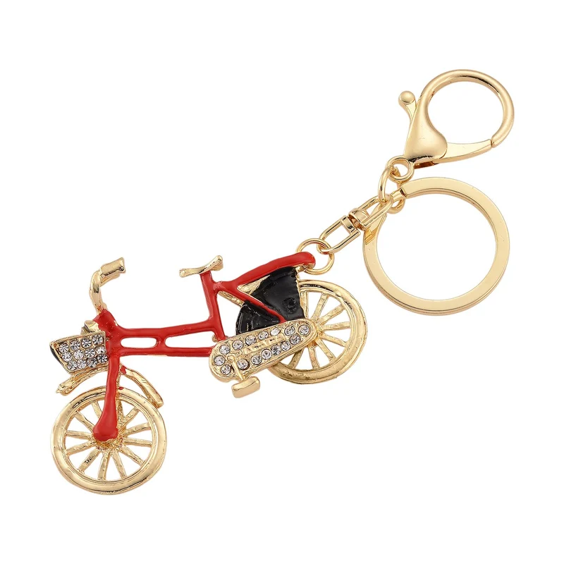 3er-Set emaillierte weiße, schwarze und rosa Kristall-Schlüsselanhänger mit Fahrrad, Kamel und geflügelter Ballerina, Legierung in Gelbgold
