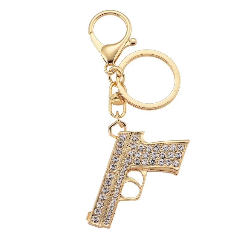 3er-Set emaillierte weiße und mehrfarbige Kristall-Schlüsselanhänger, Pistole, Stiefelette und Oktopus, Legierung in Gelbgold
