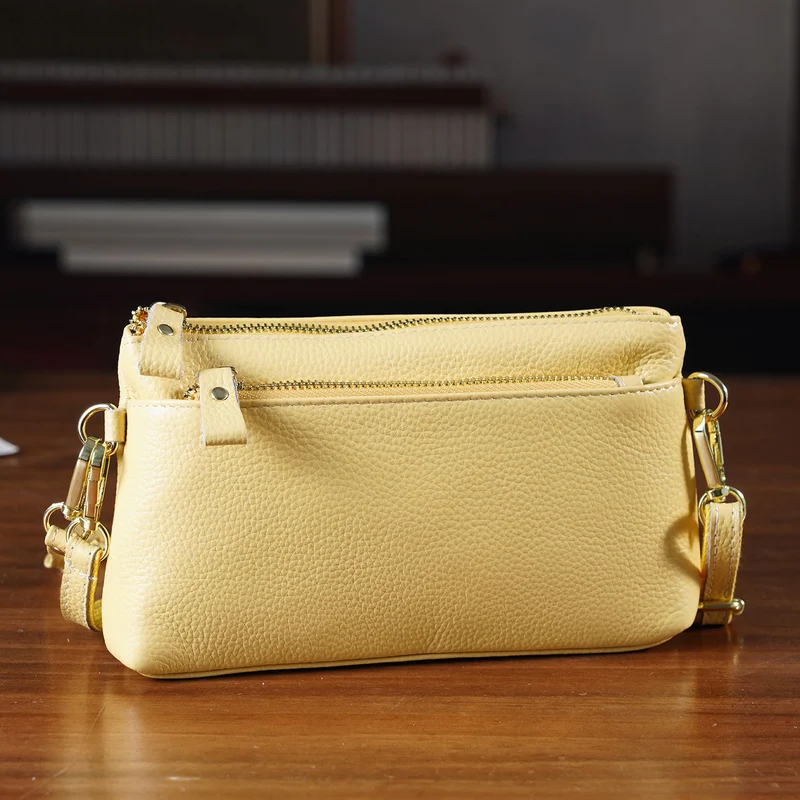 Leder Crossbody Tasche mit mehreren Reißverschlussfächern und verstellbarem Schulterriemen 21.5 x 4 x 13 cm Violett