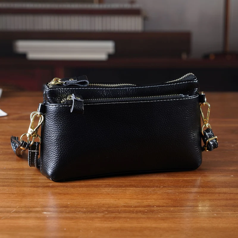 Leder Crossbody Tasche mit mehreren Reißverschlussfächern und verstellbarem Schulterriemen 21.5 x 4 x 13 cm Violett