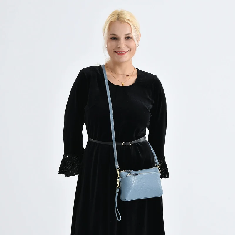 Leder Crossbody Tasche mit mehreren Reißverschlussfächern und verstellbarem Schulterriemen 21.5 x 4 x 13 cm Violett
